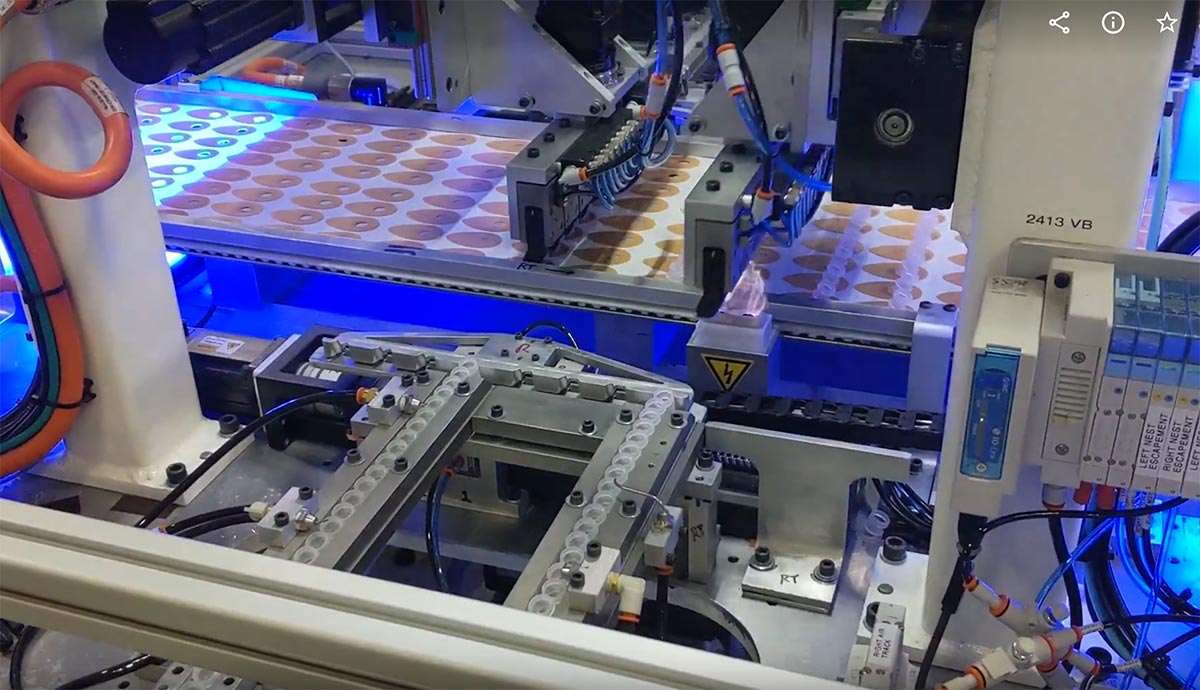Automated plastic injection molding machine