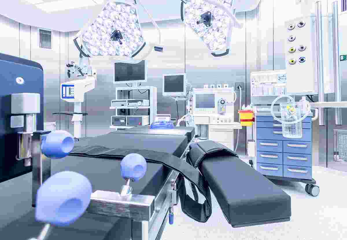 Modern hospital operating room with monitors and equipment